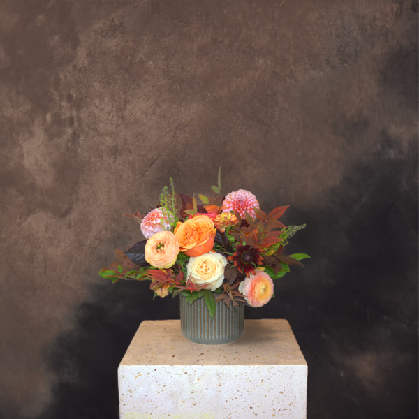 Compact autumn arrangement in warm tones, perfect for Thanksgiving table decor and seasonal events.