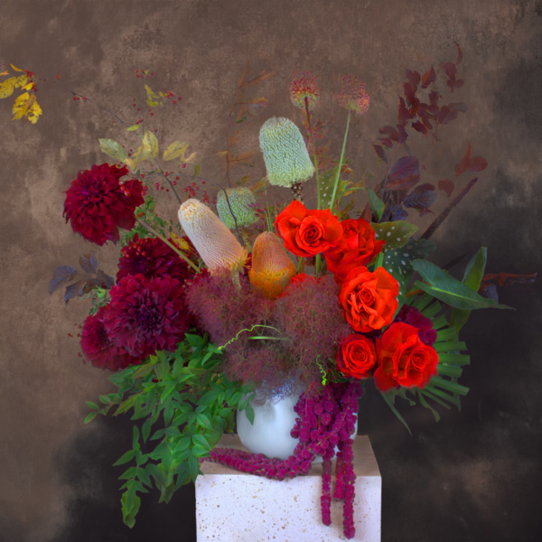 Wild, organic arrangement with bold blooms, great for nature-themed events and decor.